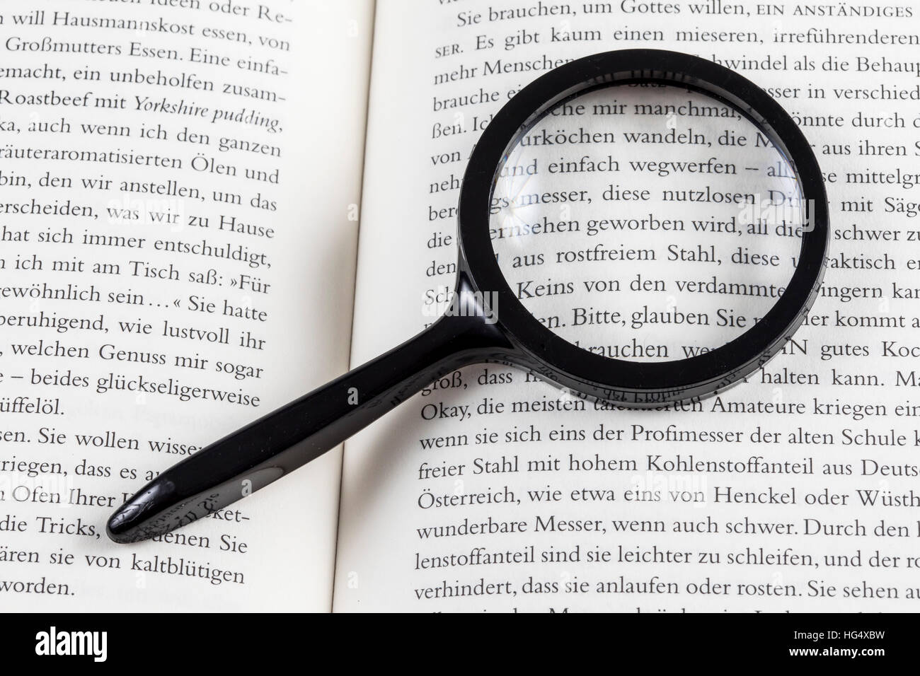 Reading aid, reading glasses, magnifying glass, loupe Stock Photo