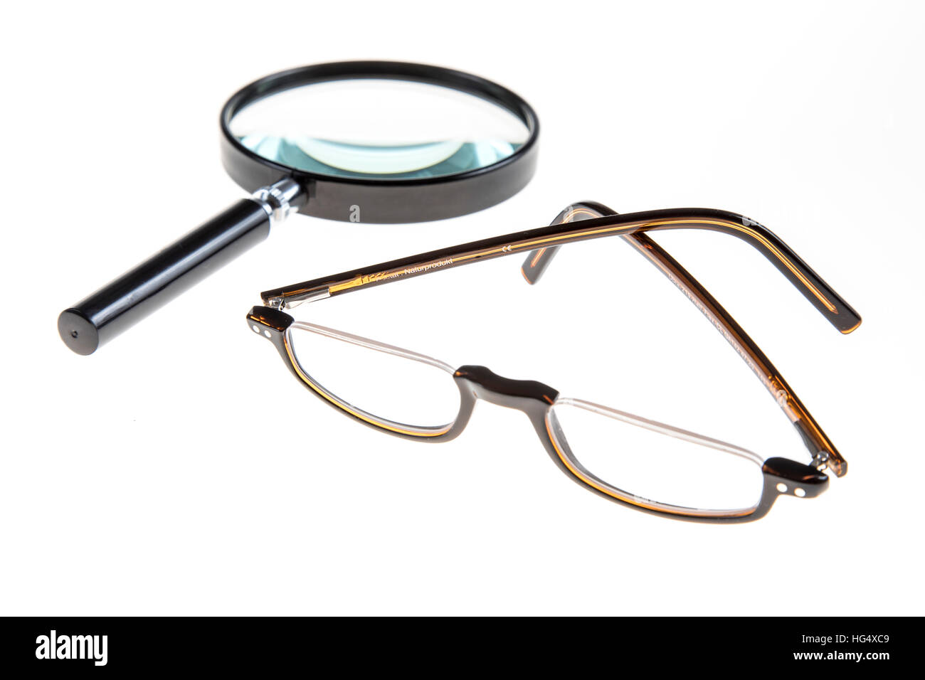 Reading aid, reading glasses, magnifying glass, loupe Stock Photo
