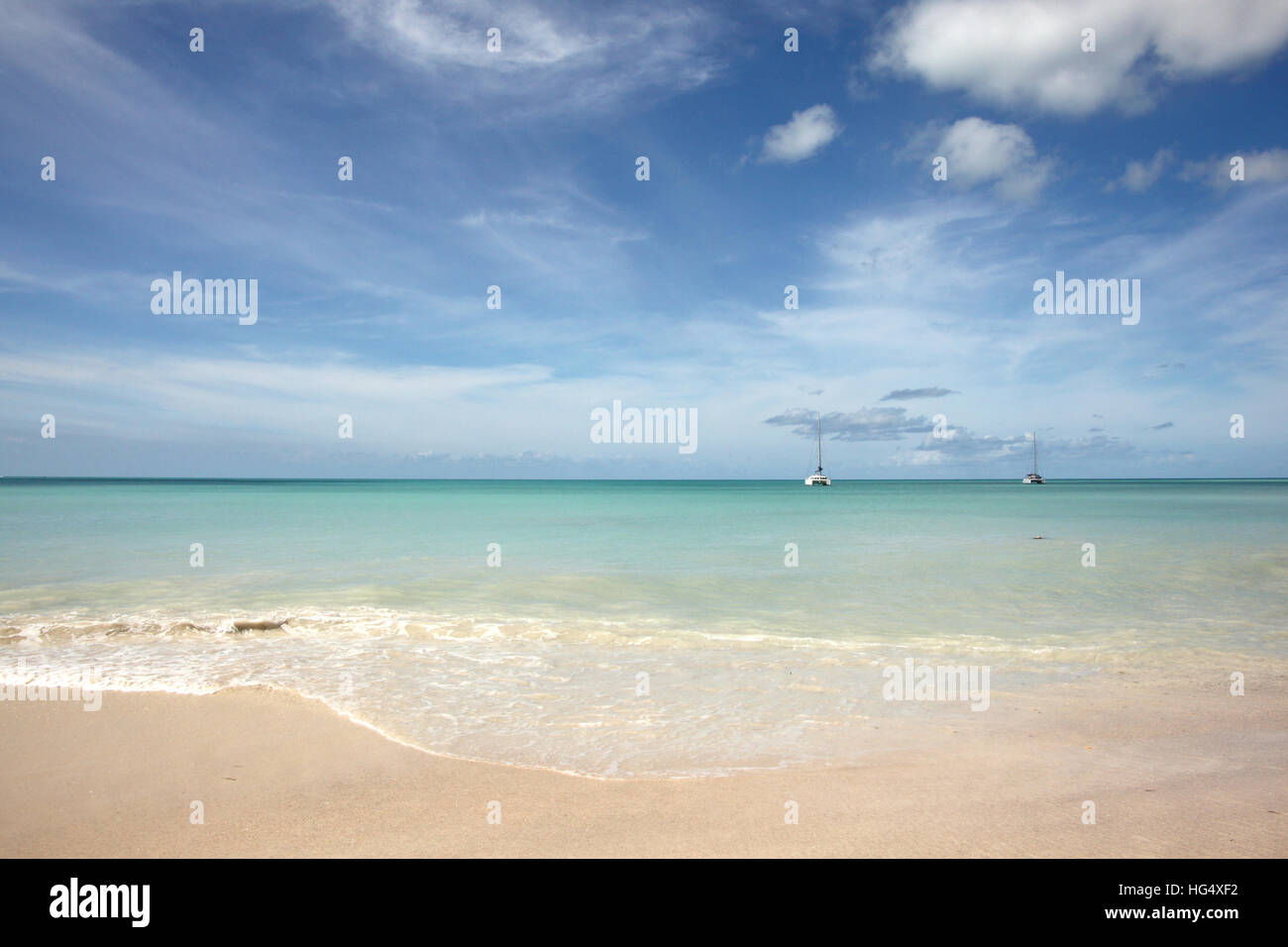 View out to sea with a view over beautiful Runaway beach in Antigua, Caribbean. Stock Photo