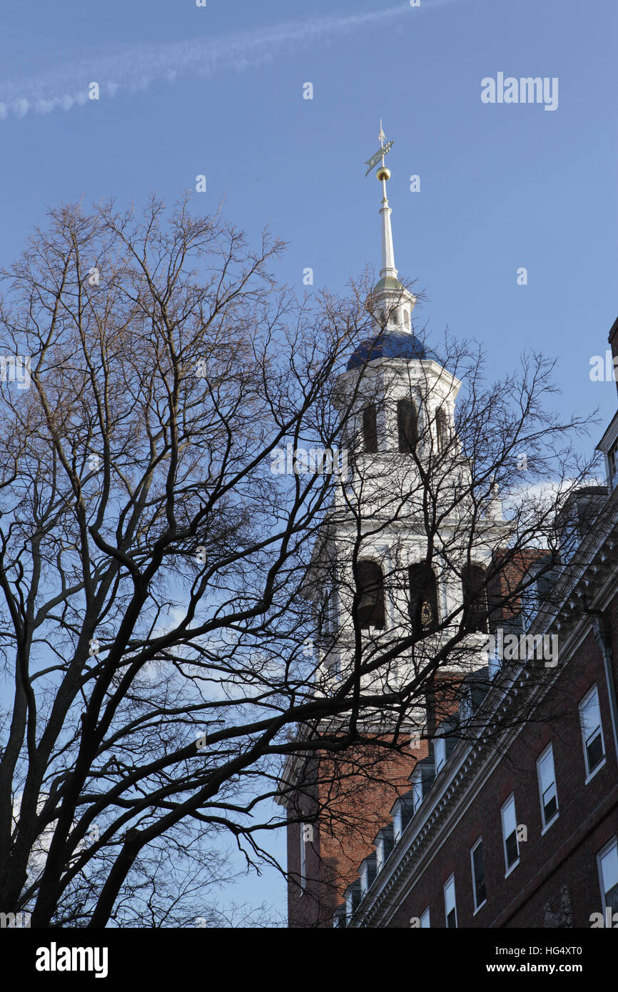 Harvard University campus on an autumn morning. The spire of Lowell House, one of twelve undergraduate residential Houses at Harvard University Stock Photo
