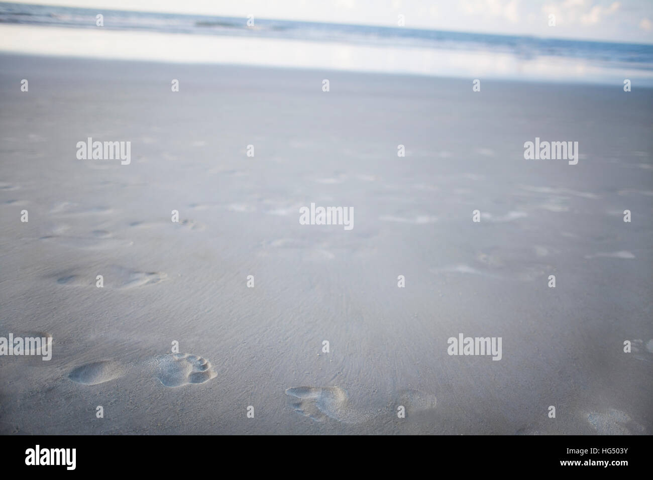 Footprints in the sand at beach Stock Photo - Alamy