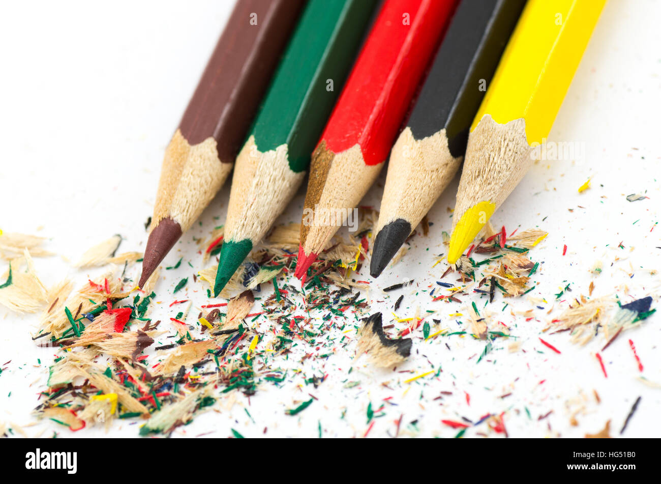 Color Pencils and Shavings. Five color pencils. Stock Photo