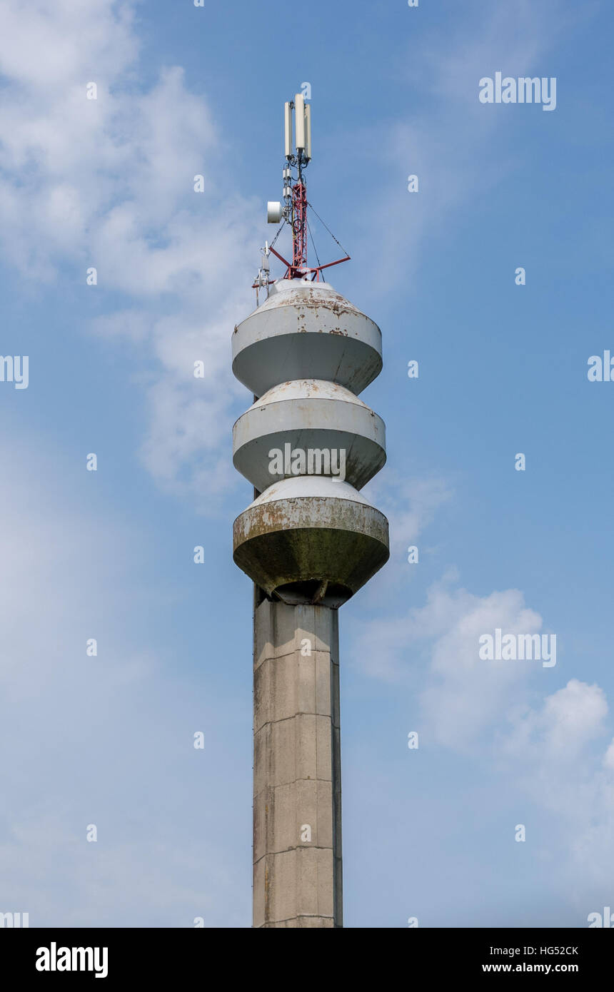 The old and rusty water tower in sky background Stock Photo - Alamy