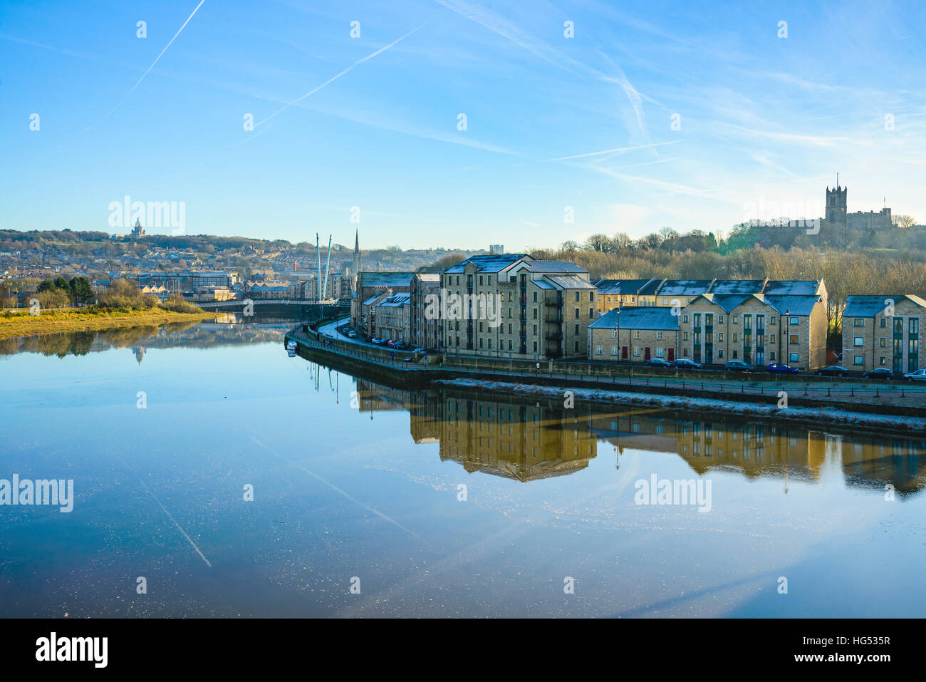 River Lune and St George's Quay Lancaster Lancashire England. Ashton Memorial on left skyline, Priory Church on right Stock Photo