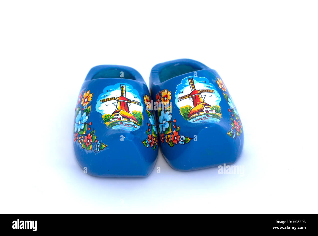 Traditional dutch wooden shoes made of wood on white background Stock