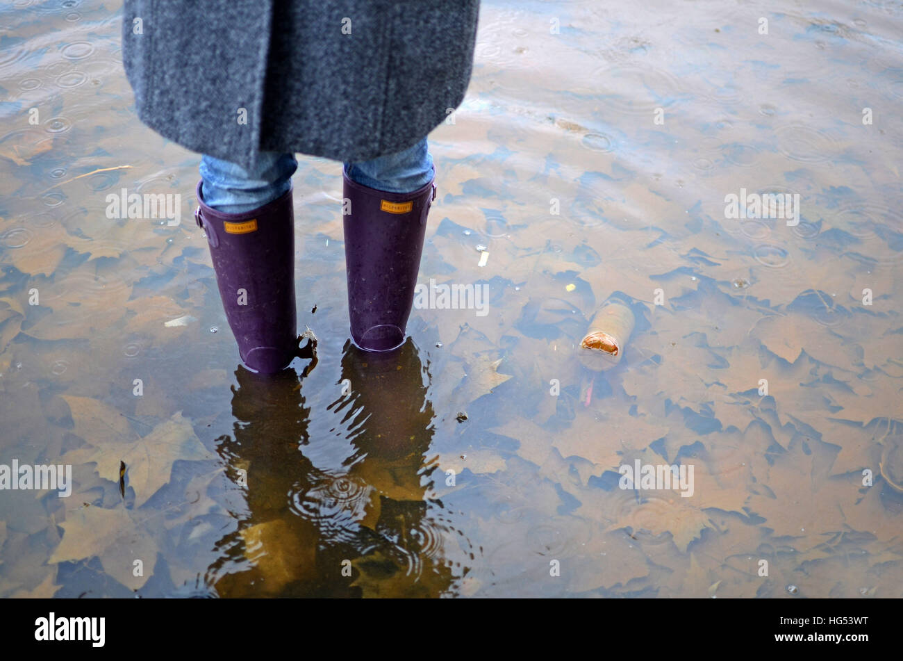 Young woman with umbrella and rain boots Stock Photo Alamy