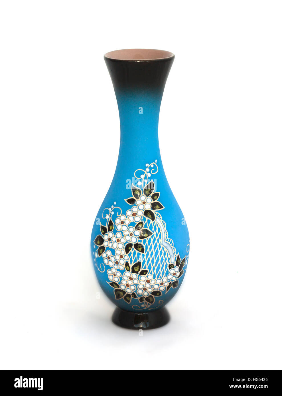 Blue vase with flower decoration on a white background Stock Photo - Alamy