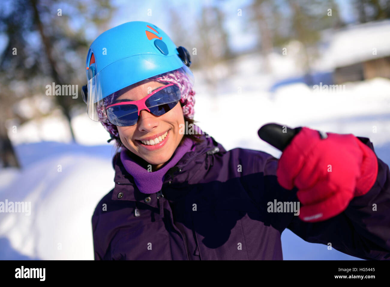 Young woman ice climbing in Pyh‰, Lapland, Finland Stock Photo