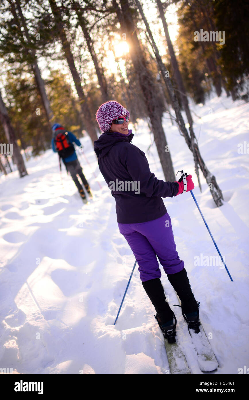 Young woman practicing Altai Skiing in Pyh‰ ski resort, Lapland, Finland Stock Photo
