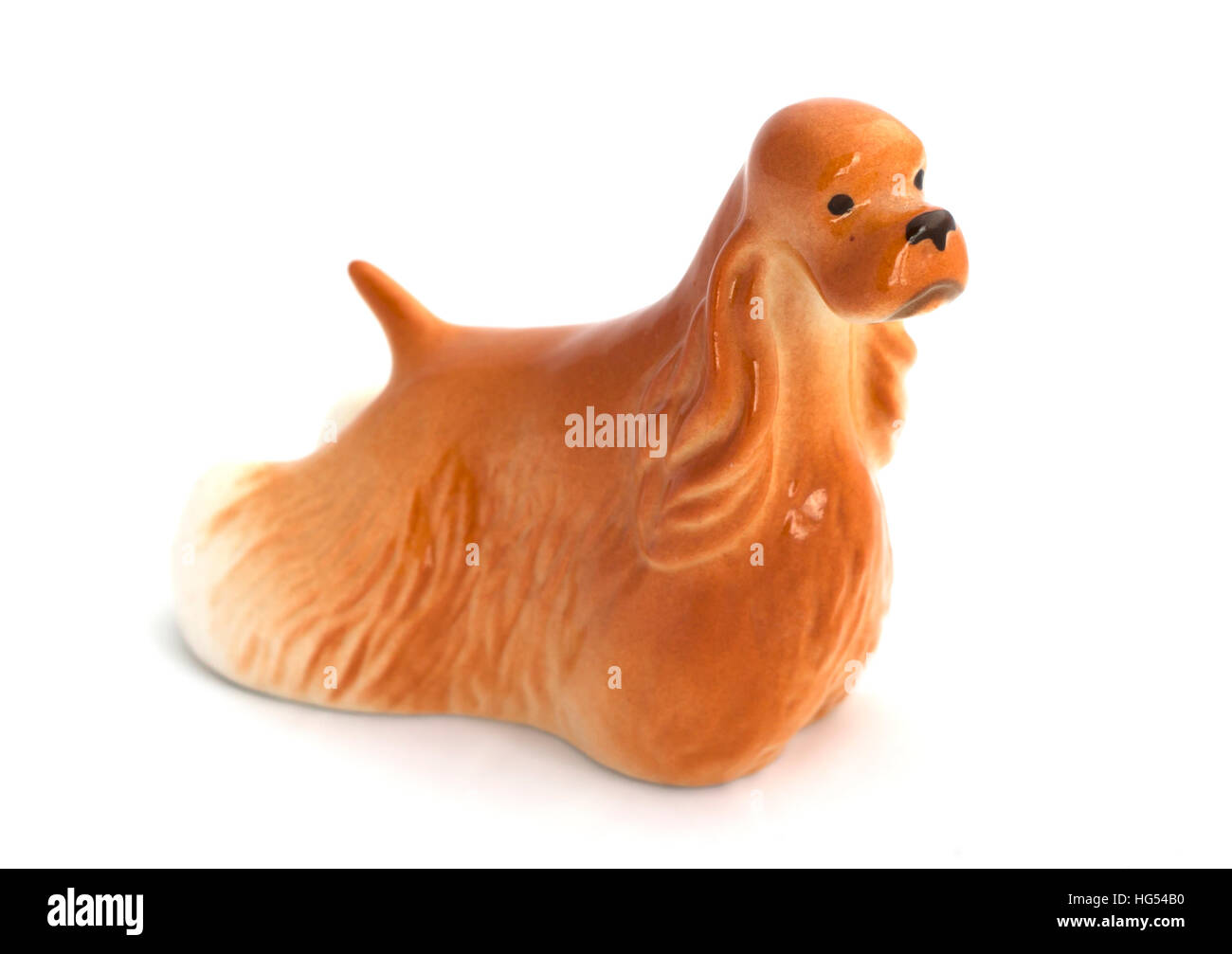 Porcelain dog figurines on a white background Stock Photo Alamy