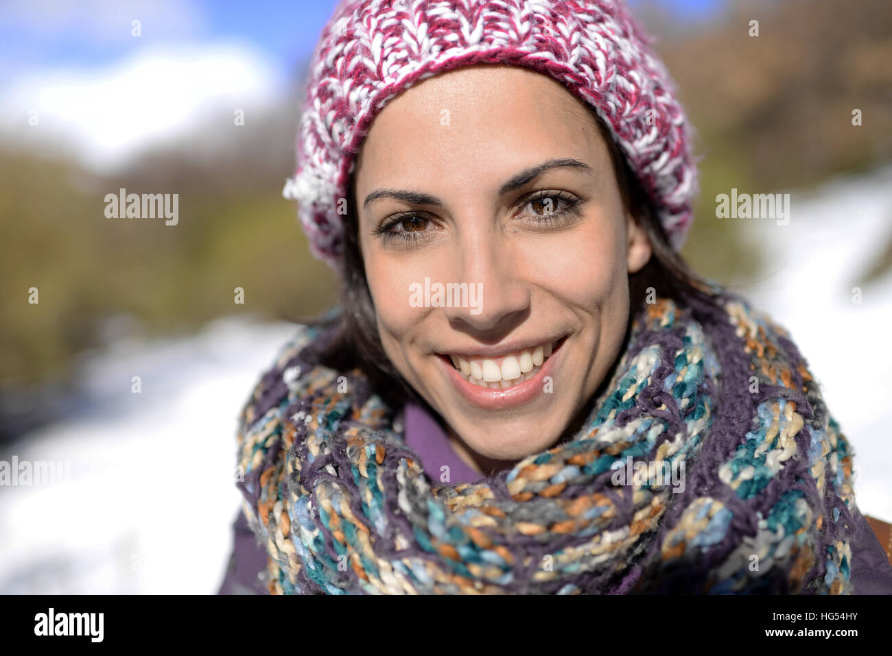 Attractive young woman in winter environment Stock Photo
