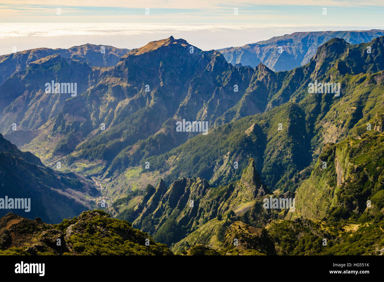 View from Pico Ruivo Madeira’s highest summit with Curral das Freiras far below Stock Photo