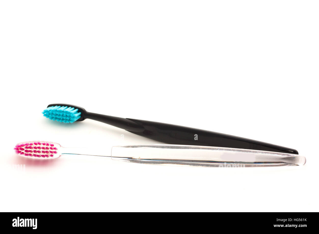Two toothbrushes on a white background, isolated Stock Photo - Alamy