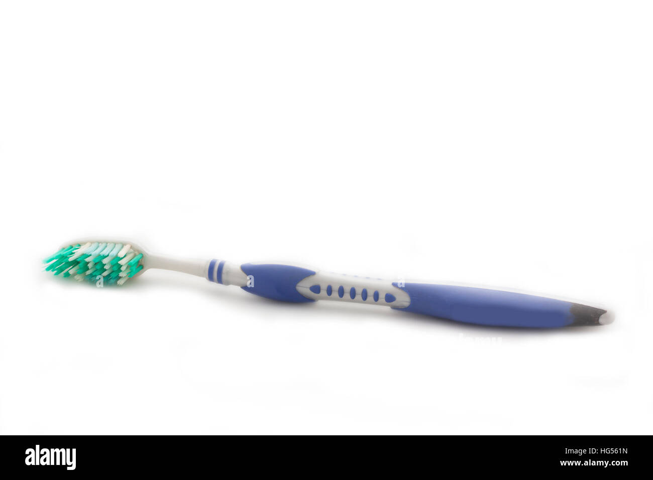 Blue toothbrush on a white background, isolated Stock Photo - Alamy