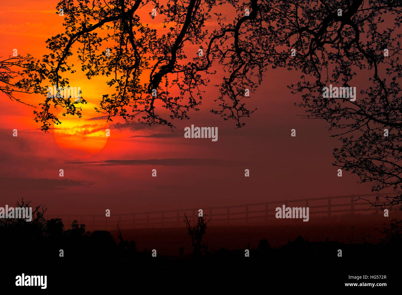 Sunrise over agricultural farmland in the countryside of North Yorkshire near the market town of Malton in the United Kingdom. Stock Photo