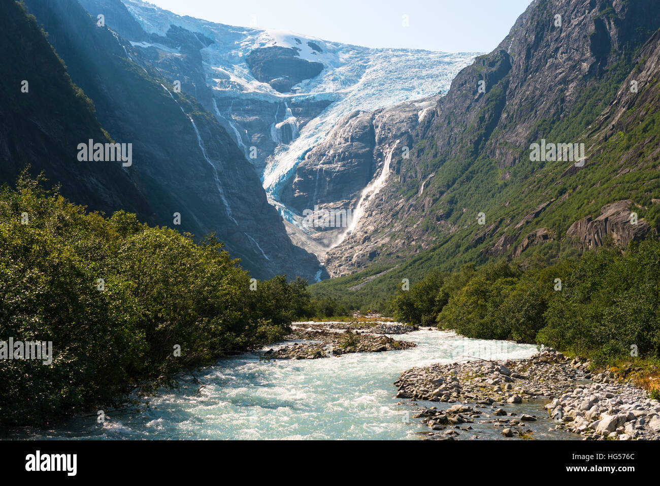 Norway scenic landscape with mountains, glacier and river. Briksdal Glacier is part of the Jostedal glacier ice field. Stock Photo
