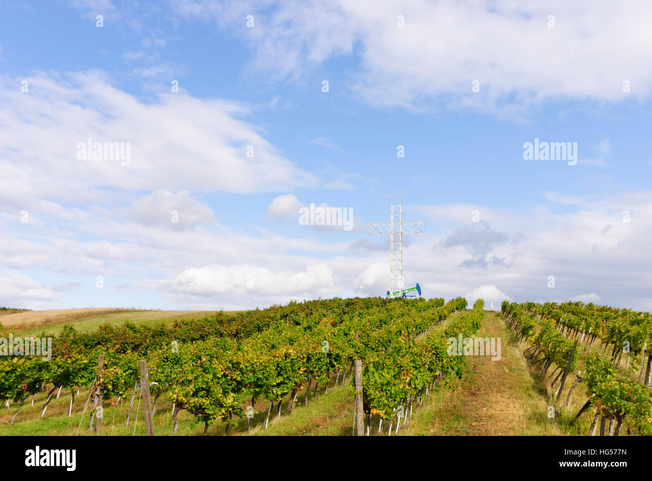 Prottes: Petroleum pump in the Matzen field of the OMV and Babara Cross to commemorate workers of the OMV in the midst of vineyards who had been kille Stock Photo