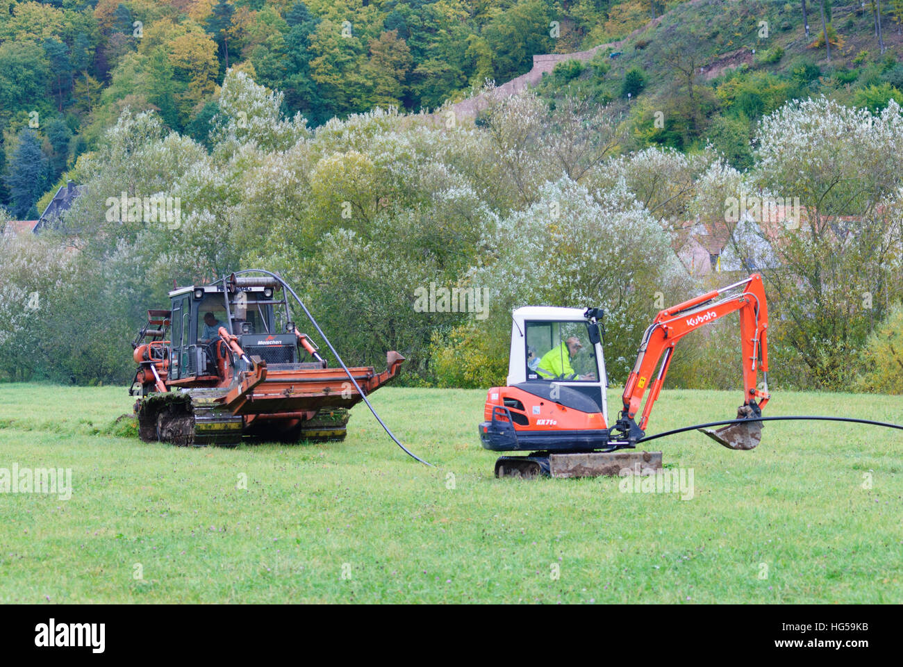 Freudenberg: Transfer of a Telekom cable by means of cable plough, Taubertal, Baden-Württemberg, Germany Stock Photo