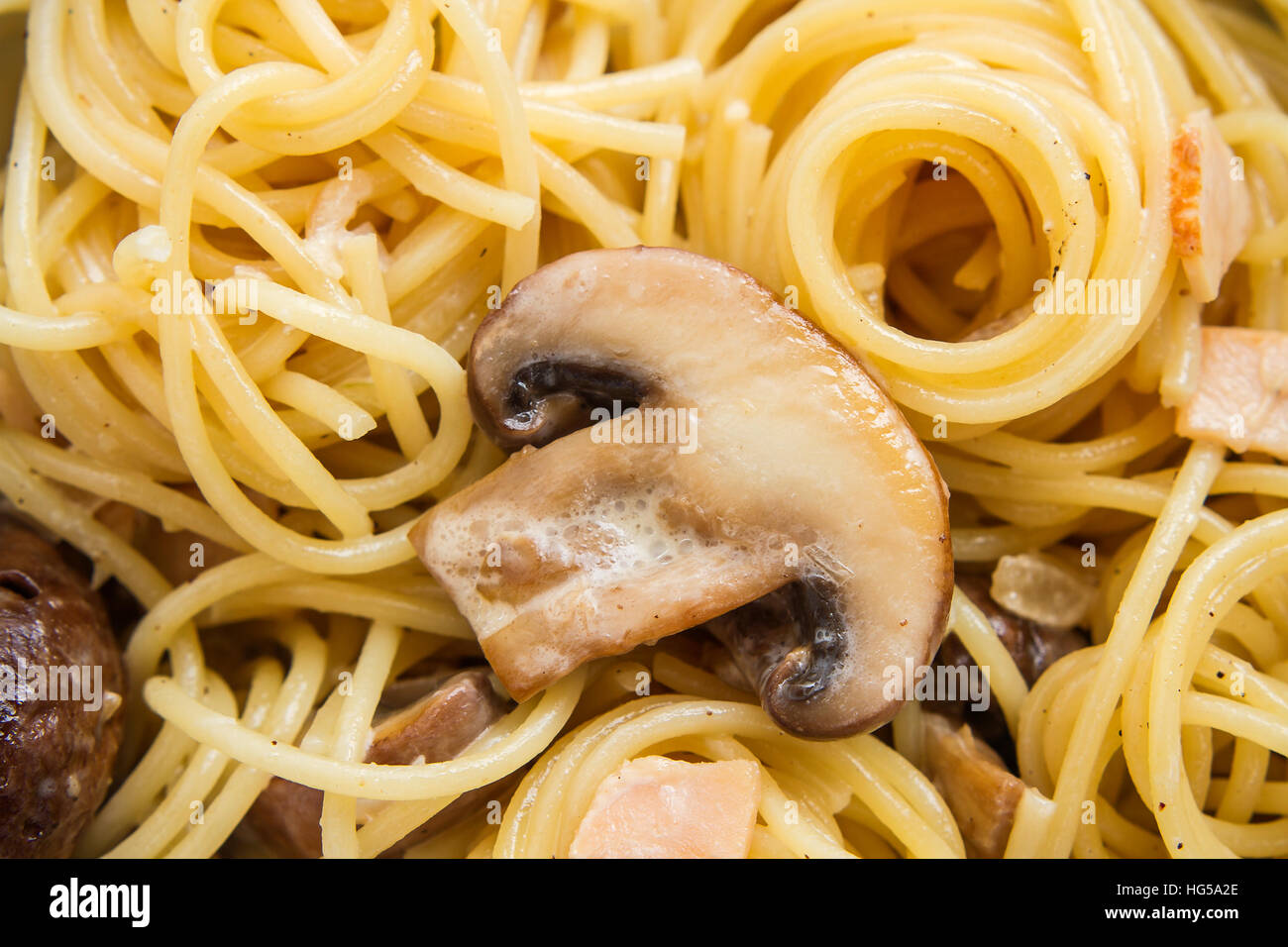 Spaghetti carbonara with mushroom, macro, soft focus Stock Photo