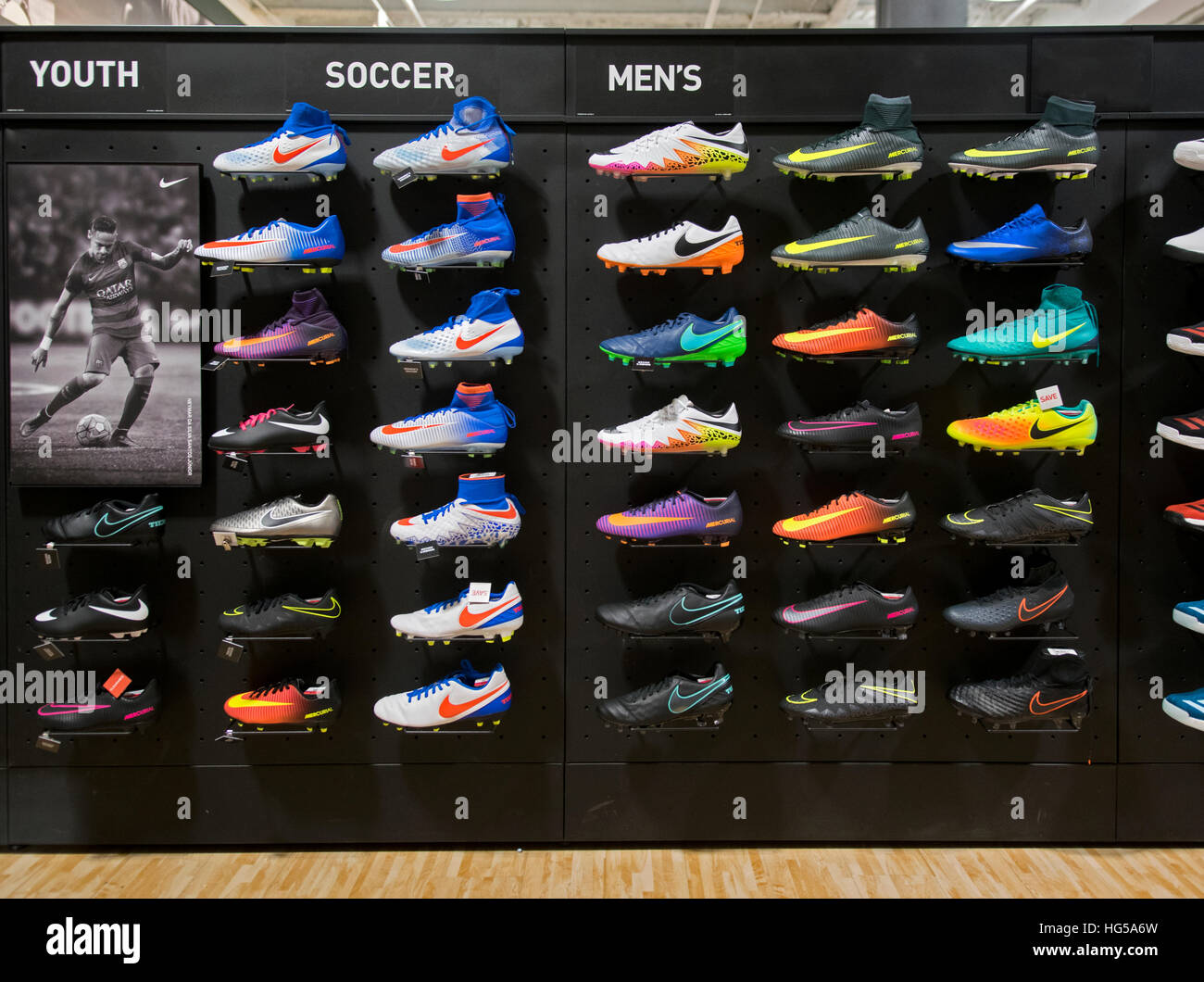 Colorful Nike soccer boots for sale at Dick's Sporting Goods at Roosevelt Field shopping center, Garden City Long Island Stock Photo