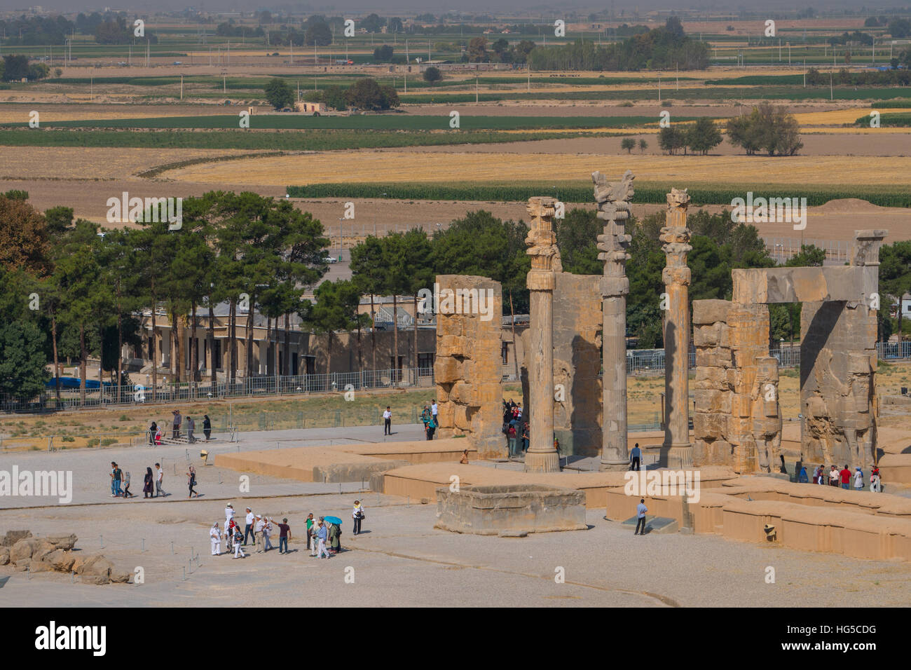 Overview of All Nations Gate and tourist groups setting off on their tours, Persepolis, UNESCO, Iran, Middle East Stock Photo