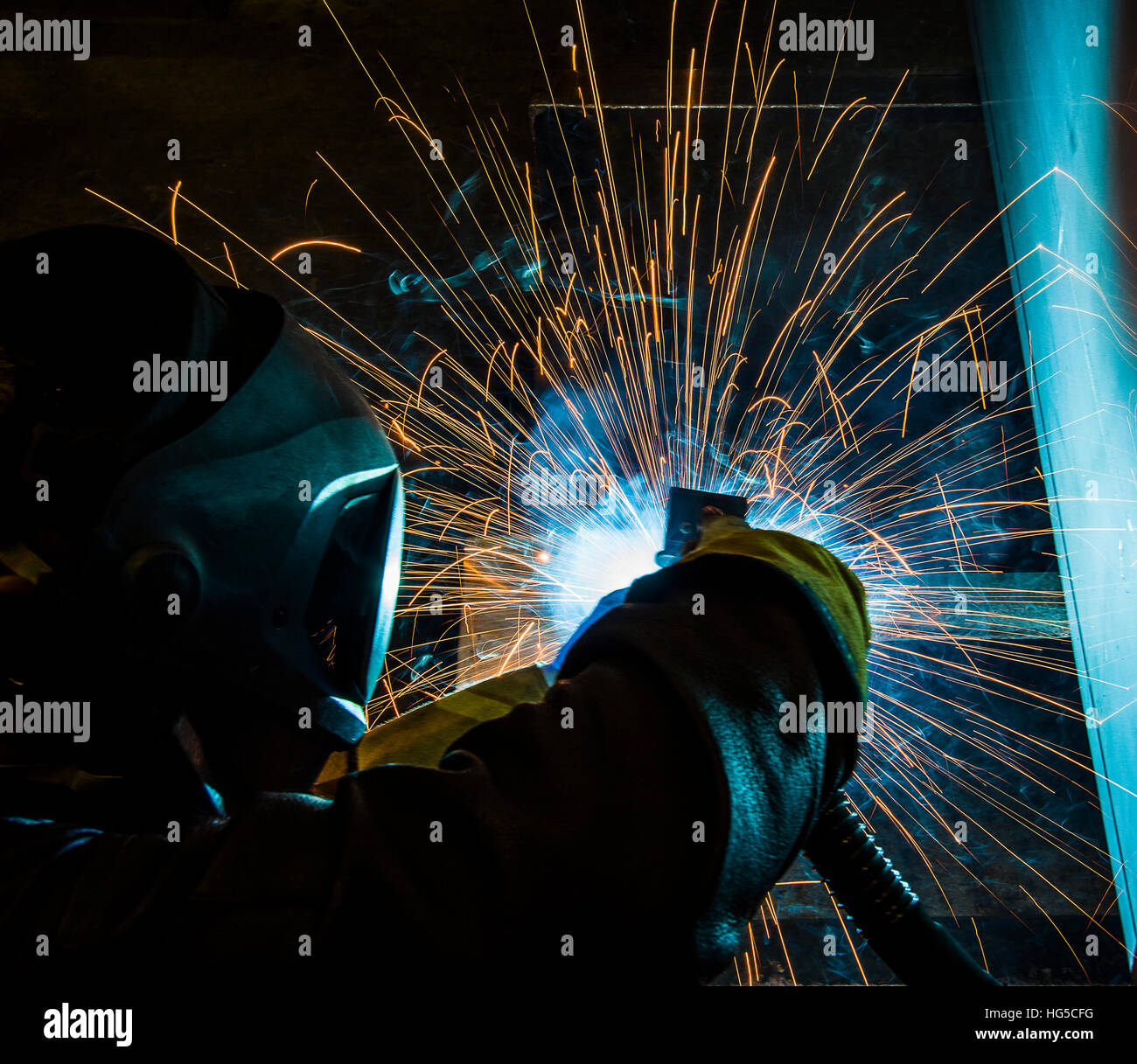 welder, craftsman, erecting technical steel Industrial steel welder in ...