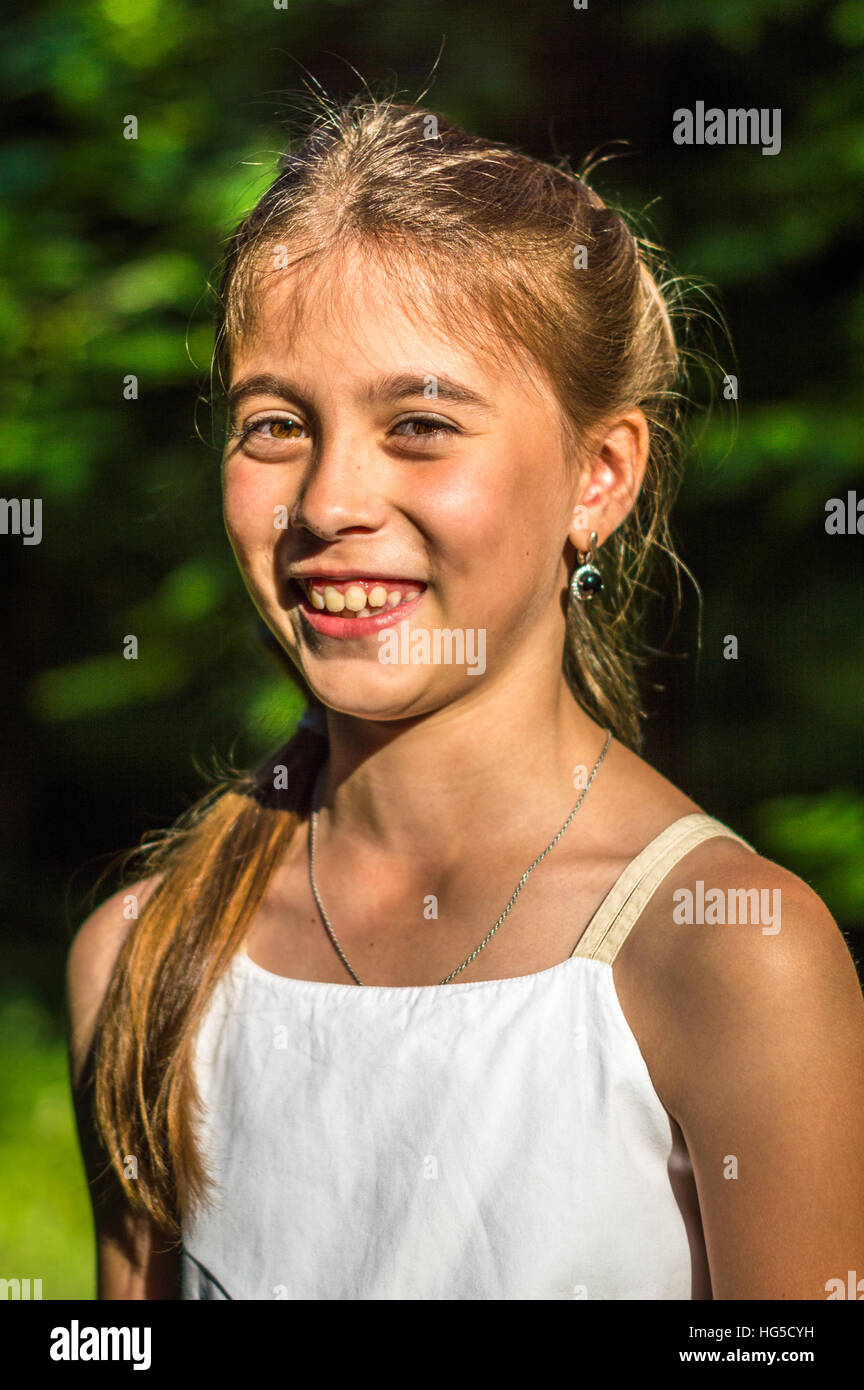 Portrait of beautiful girl in the Park Stock Photo - Alamy