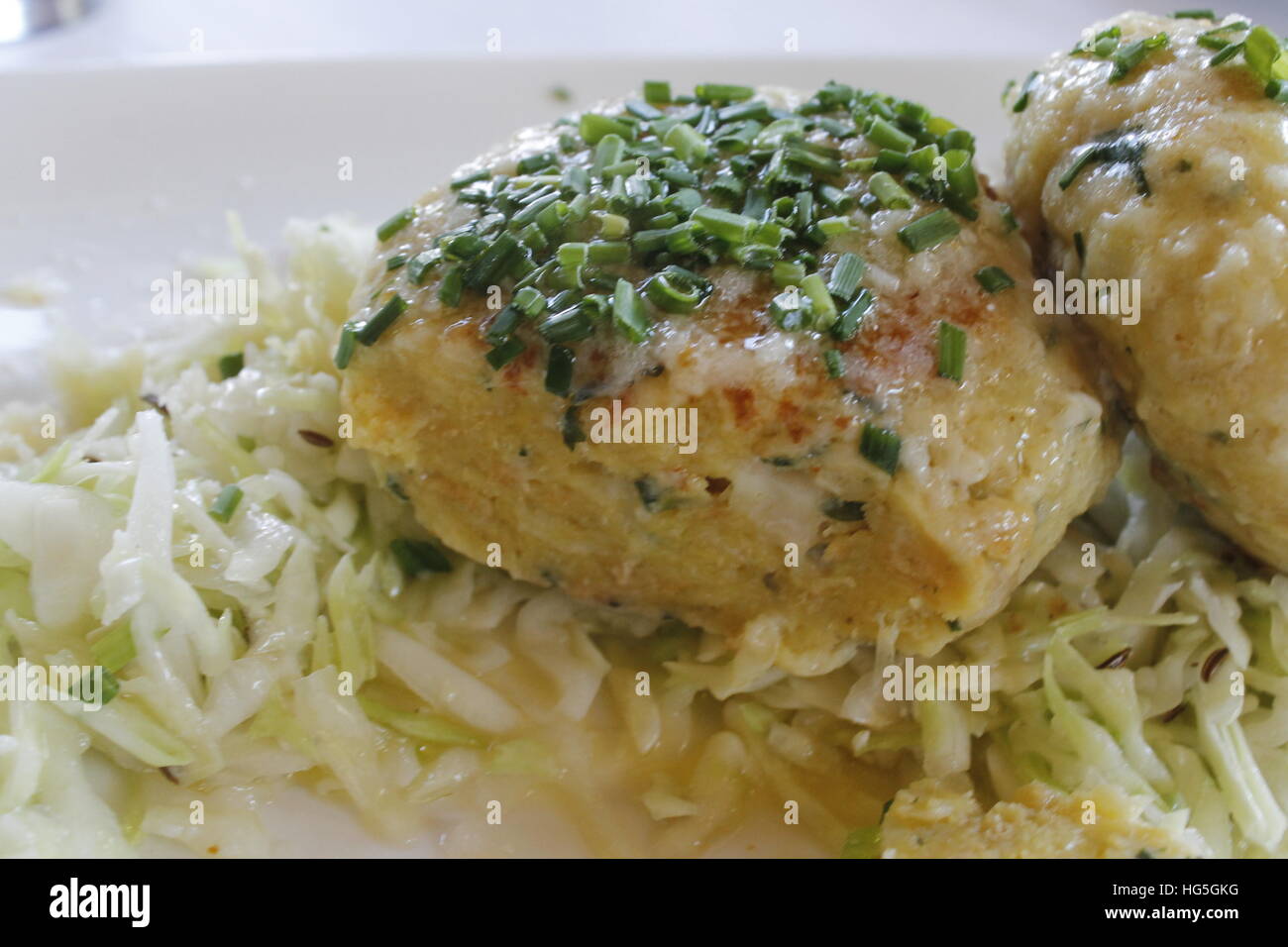 Tyrolean traditional dish, knodel or canederli with parsley Stock Photo