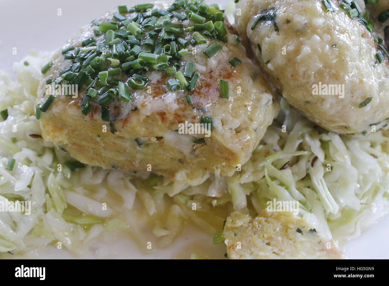 Tyrolean traditional dish, knodel or canederli with parsley Stock Photo