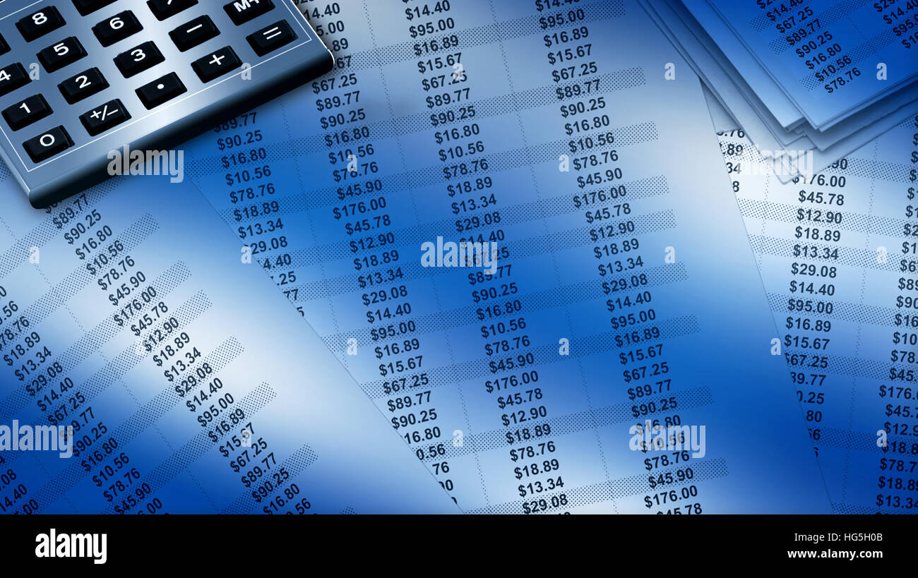 Accounting papers with numbers are spread with a calculator in the image. Stock Photo