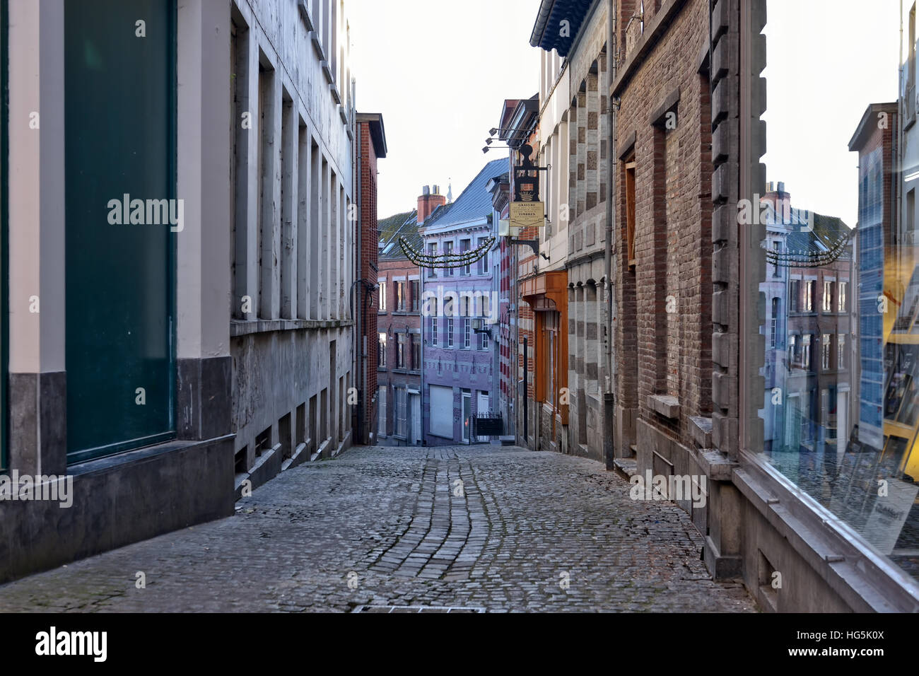 Narrow street in historical center of Mons, Belgium, on December 29, 2016 Stock Photo
