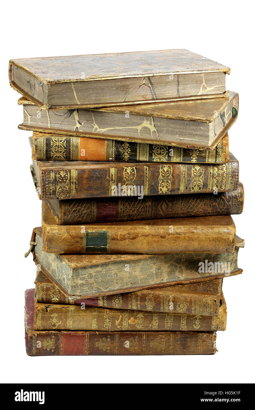 pile of antique books isolated on white background Stock Photo