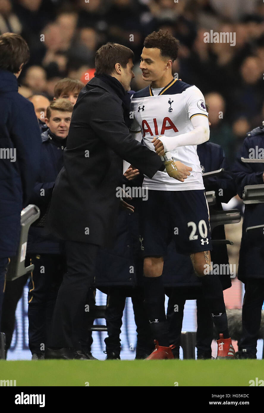 Tottenham Hotspur's Dele Alli shakes hands with manager Mauricio Pochettino after the Premier League match at White Hart Lane, London. Stock Photo