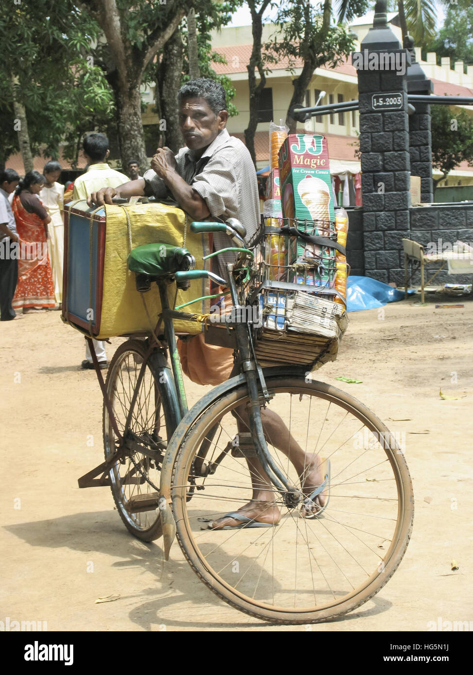 Ice Candy seller on bicycle. Kerala, India Stock Photo