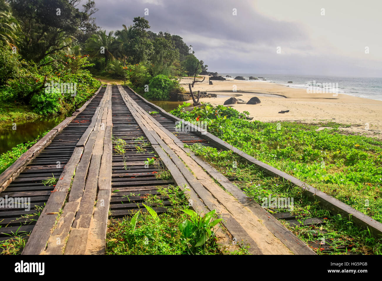 Small wooden bridge on the rural road to Maroantsetra Stock Photo