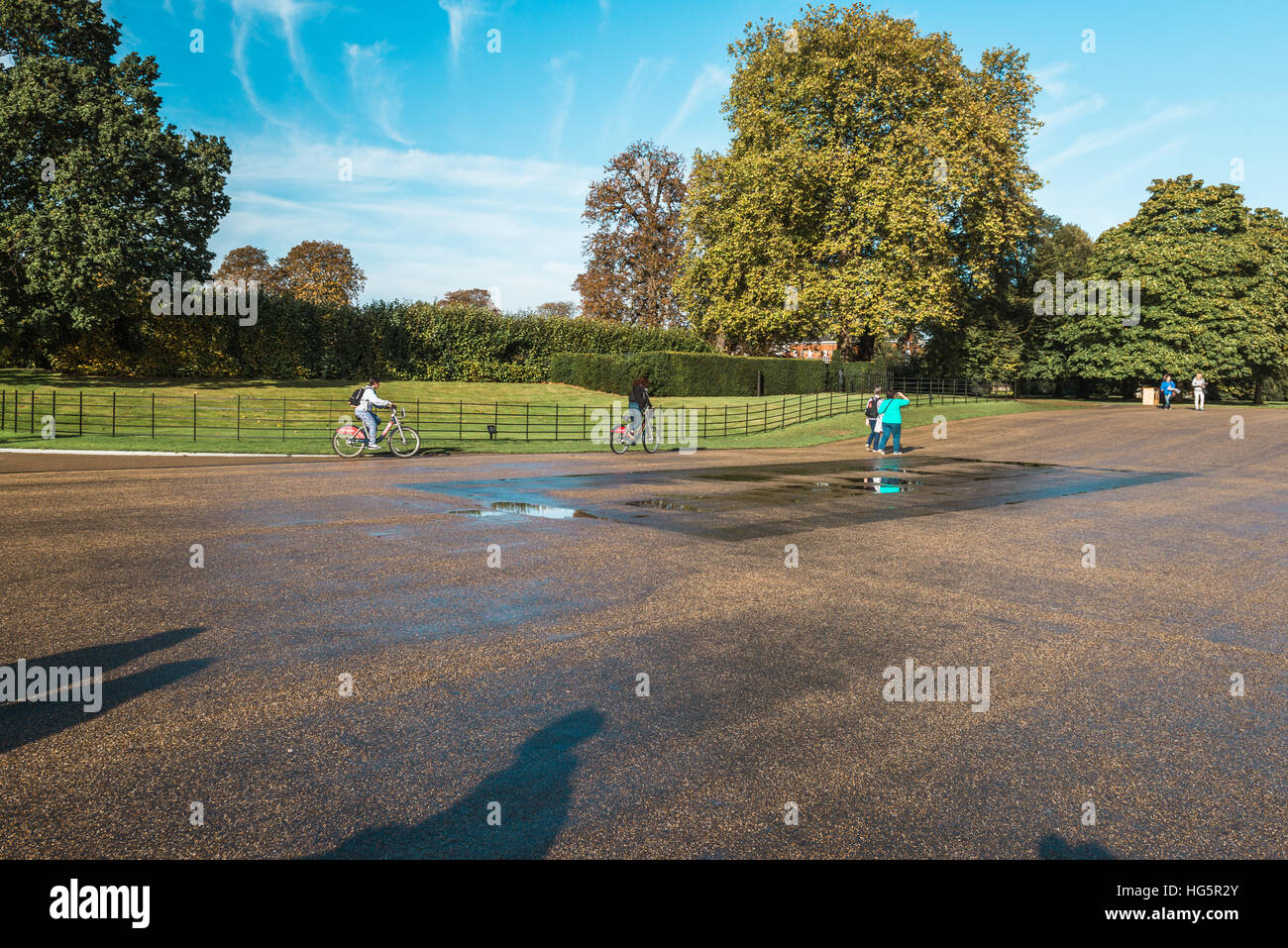 London, United Kingdom - October 17, 2016: People are visiting Kensington Gardens outside of Kensington Palace in London, England Stock Photo
