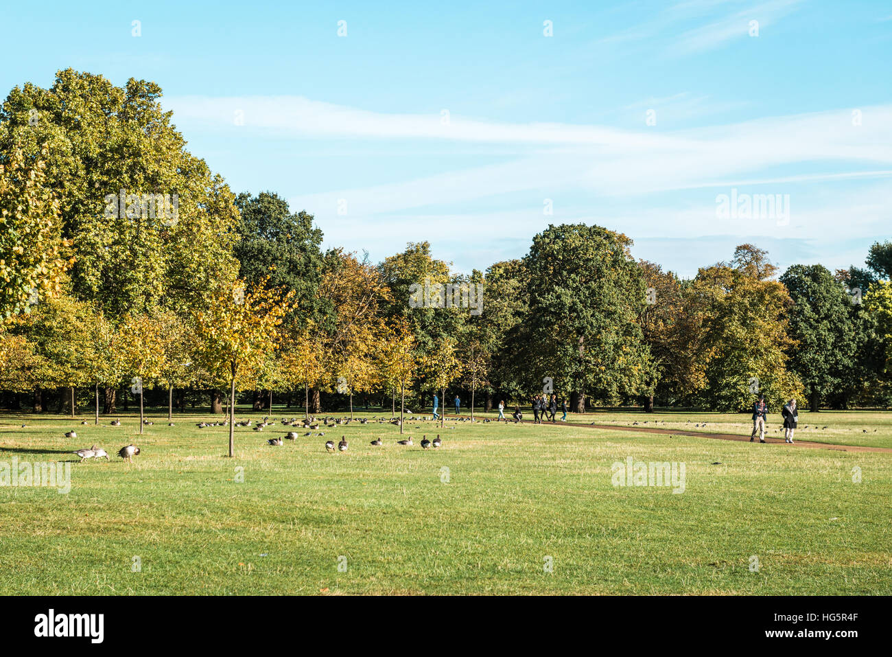 London, United Kingdom - October 17, 2016: People are visiting Kensington Gardens outside of Kensington Palace in London, England Stock Photo