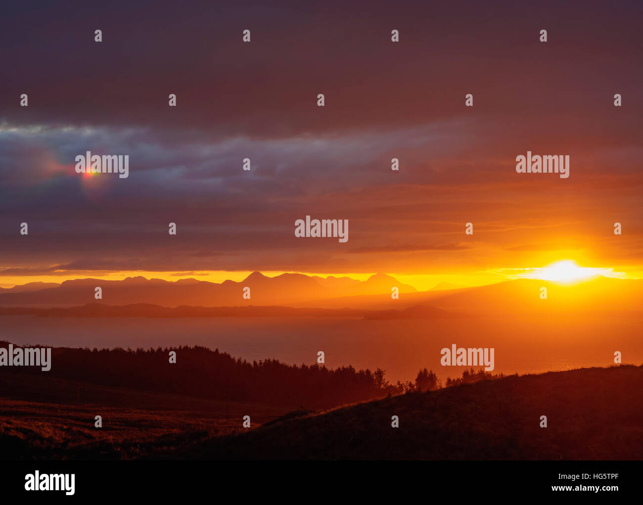 UK, Scotland, Highlands, Isle of Skye, Sunrise observed near The Storr. Stock Photo