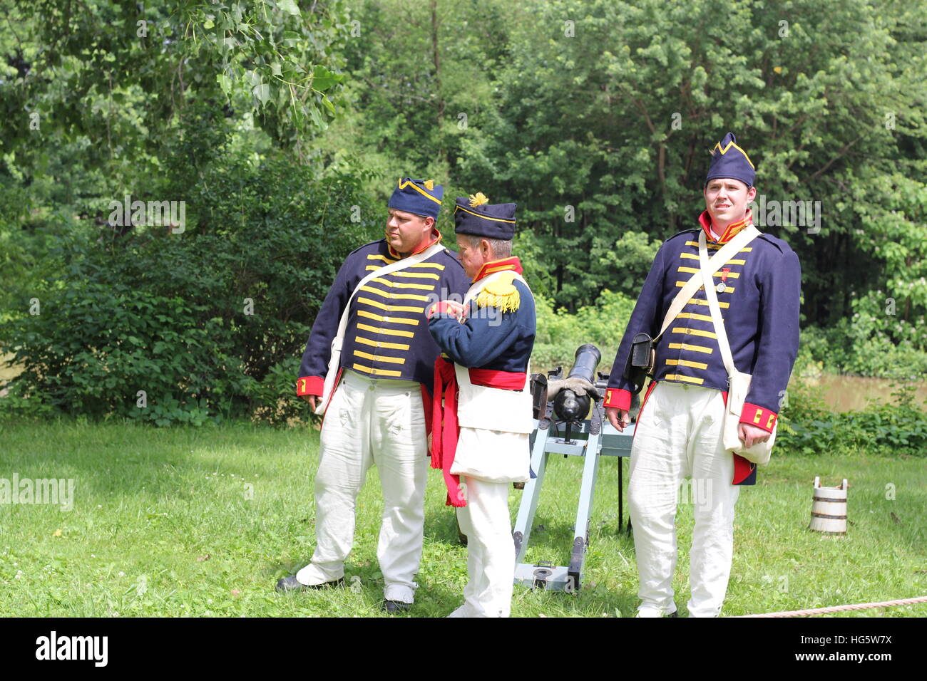 Three reenactors standing at the ready at the Old Fort in Fort Wayne, Indiana, USA. Stock Photo