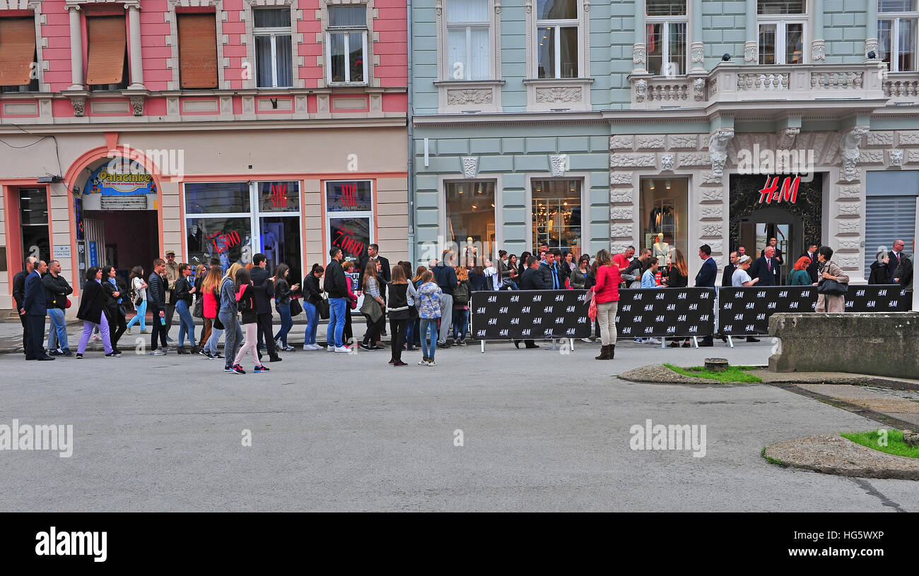 NOVI SAD, SERBIA - MAY 13: People waiting for opening H&M first store in Novi Sad, Serbia on May 13, 2016. Novi Sad is the second largest city of Serb Stock Photo
