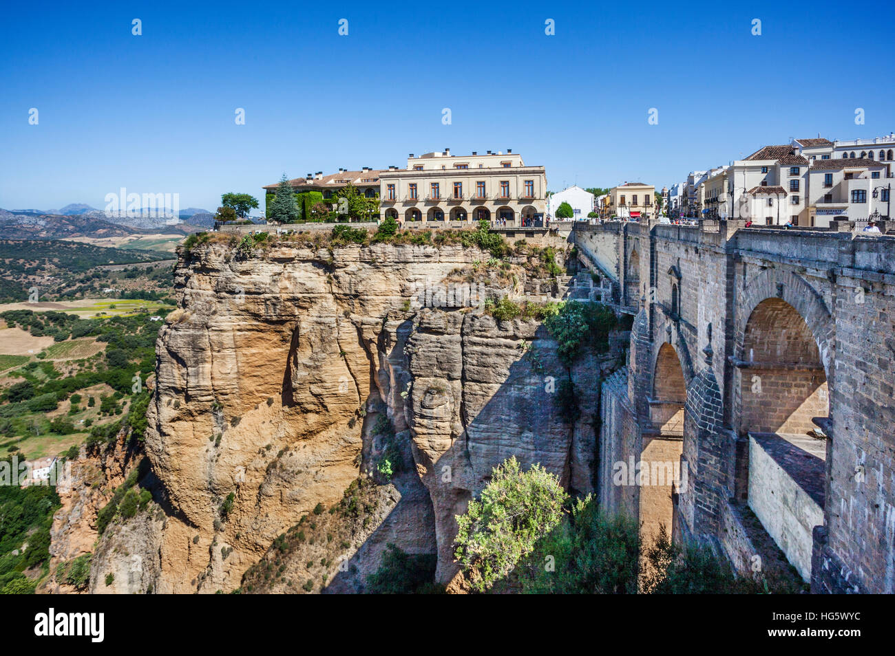 Spain, Andalusia, Province of Malaga, Ronda, Puente Nueva spanning the divide of the El Tajo Gorge, with view of La Ciudad, the Old Town Stock Photo