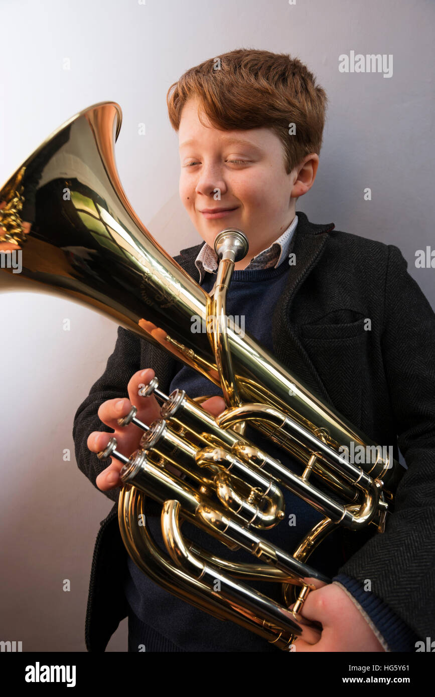 10-year old boy with Baritone horn Stock Photo