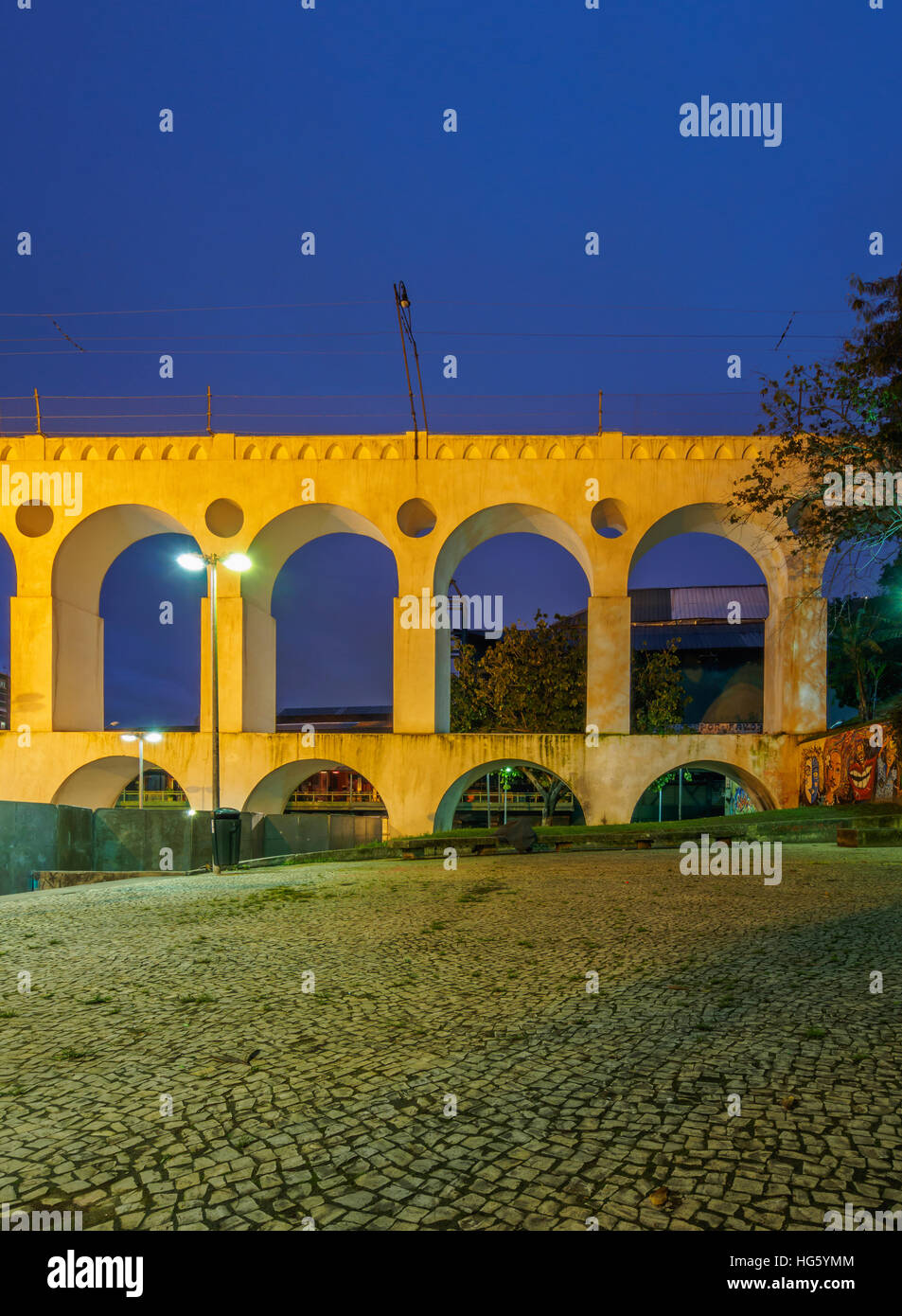 Brazil, City of Rio de Janeiro, Lapa, Twilight view of The Carioca Aqueduct. Stock Photo