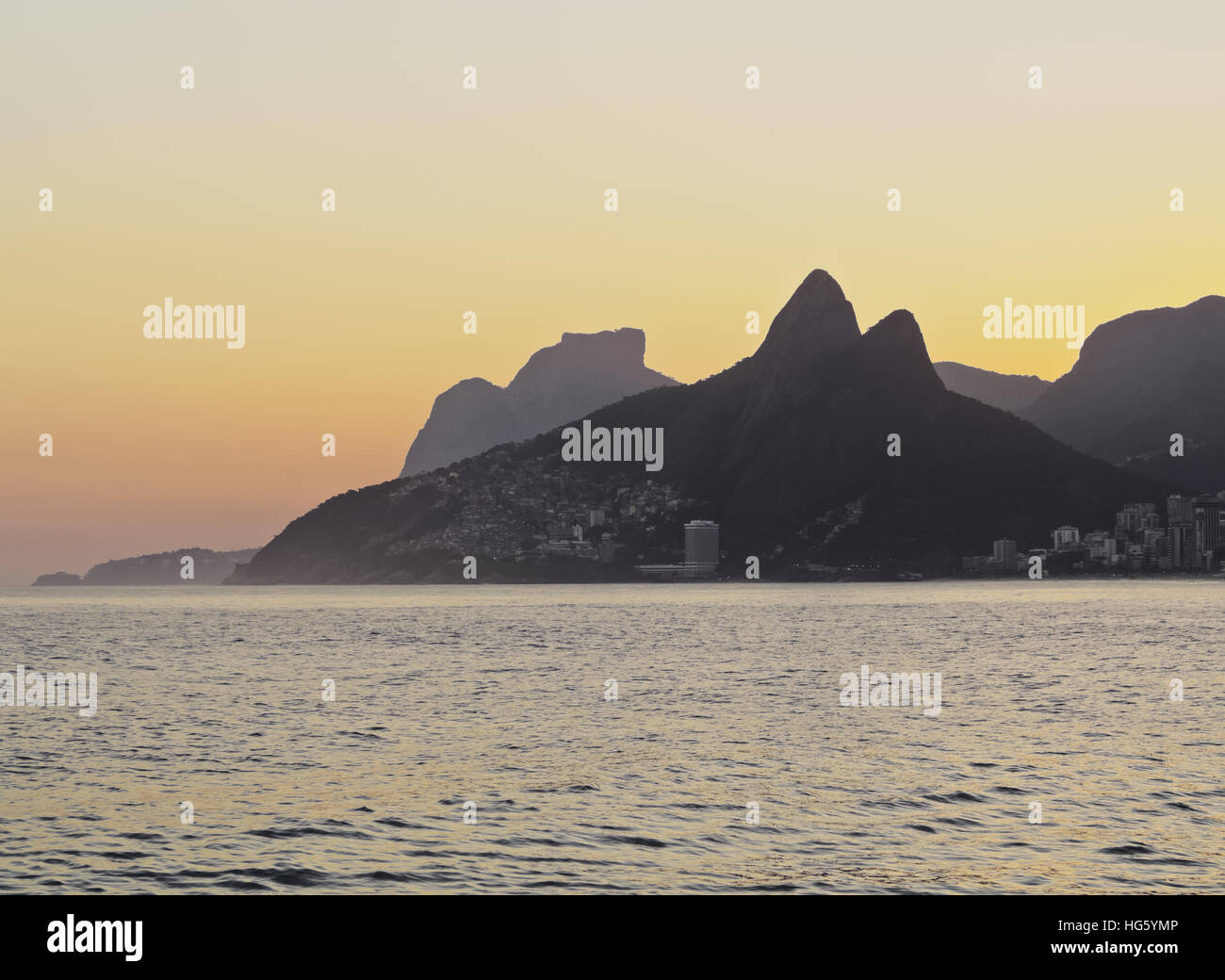 Brazil, City of Rio de Janeiro, Ipanema Beach and Morro Dois Irmaos during sunset. Stock Photo