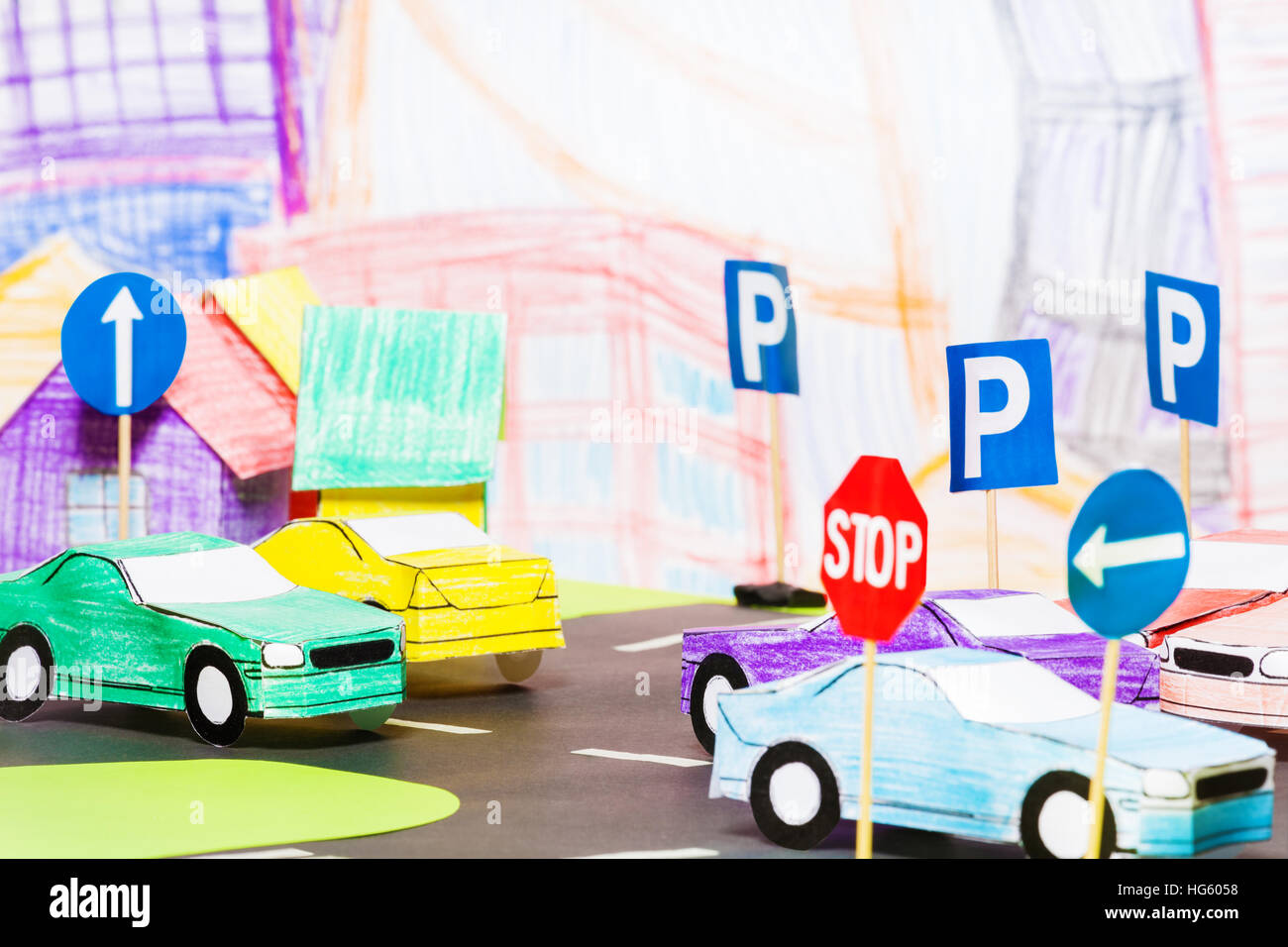 Road traffic in the toy town with handmade cars Stock Photo