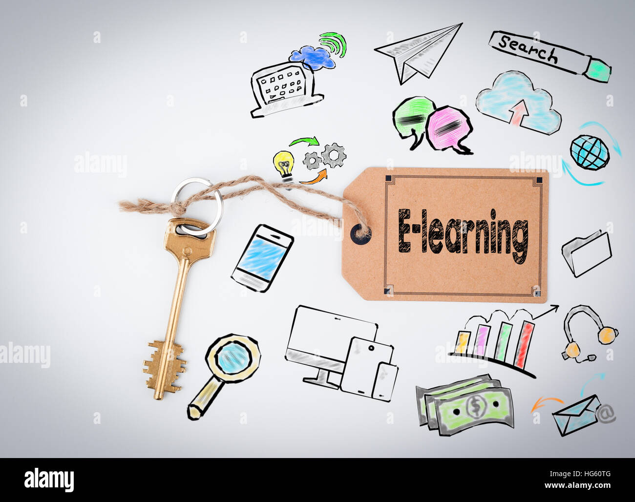 E-learning. Key and a note on a white background Stock Photo - Alamy