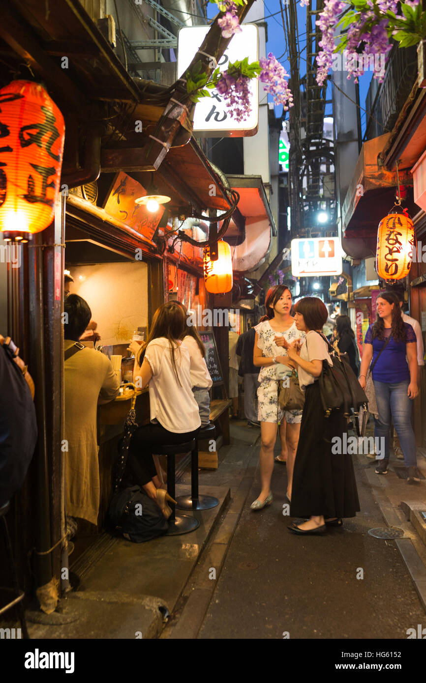 June 11, 2016 - Tokyo, Japan. The night view of 'Memory Lane', the famous alley in Shinjuku, Tokyo, famous for its yakatori restaurants Stock Photo