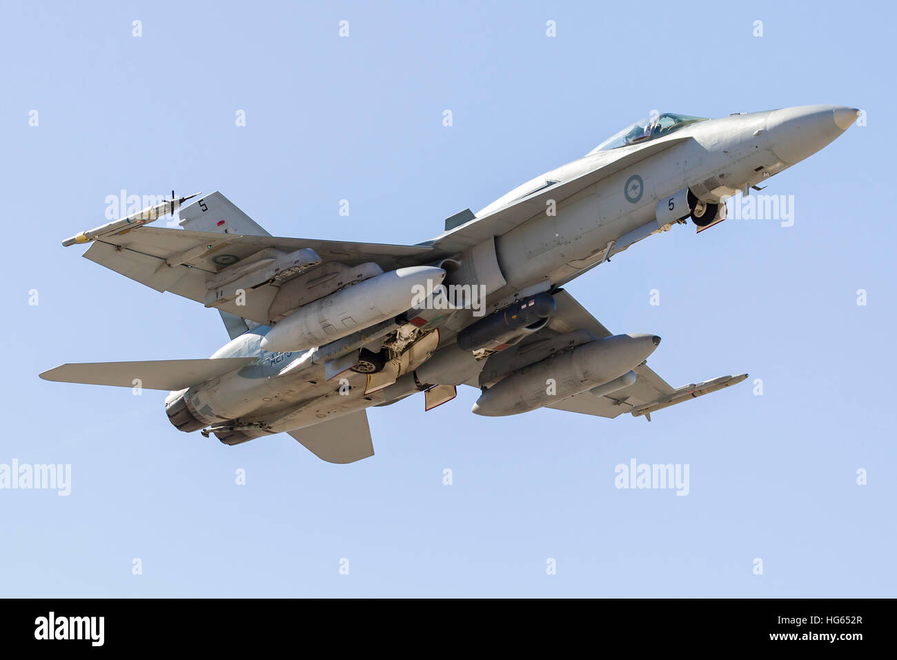A Royal Australian Air Force F/A-18A Hornet taking off Stock Photo - Alamy