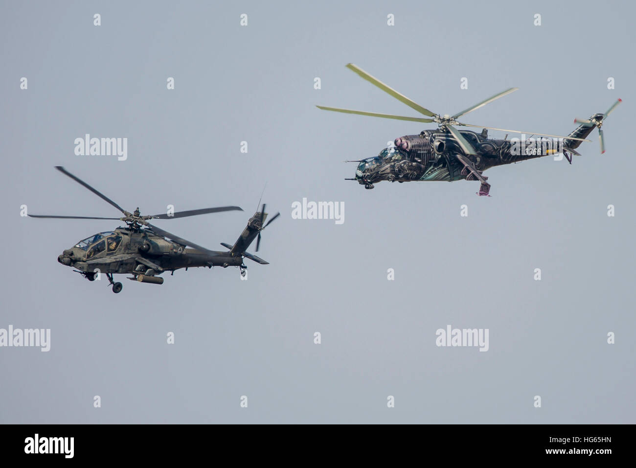A U.S. Army AH64D Apache and a Czech Air Force Mi24 training in the