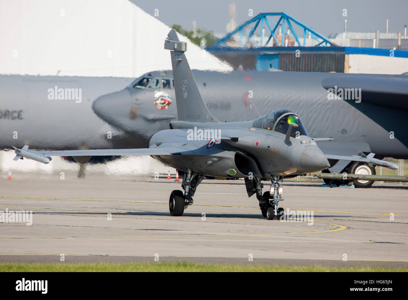 A French Air Force Dassault Rafale jet taxiing on the flight line. Stock Photo